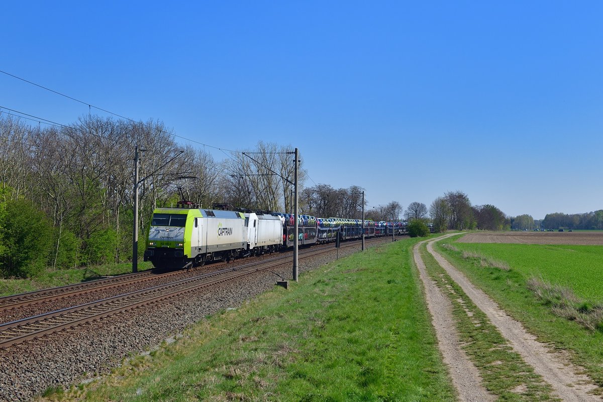 152 197 + 185 5xx mit einem Autozug am 17.04.2019 bei Woltorf.