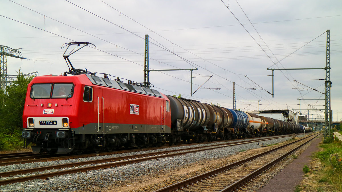 156 004-4 kam am 16.07.2019 mit einem Kesselzug durch Dessau in Richtung Roßlau.