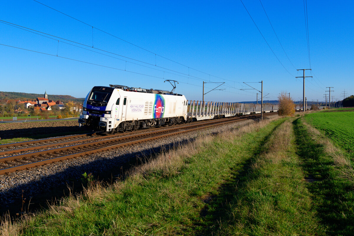 159 202 RCM/HHPI mit einem leeren Holzzug bei Markt Bibart Richtung Würzburg, 05.11.2020