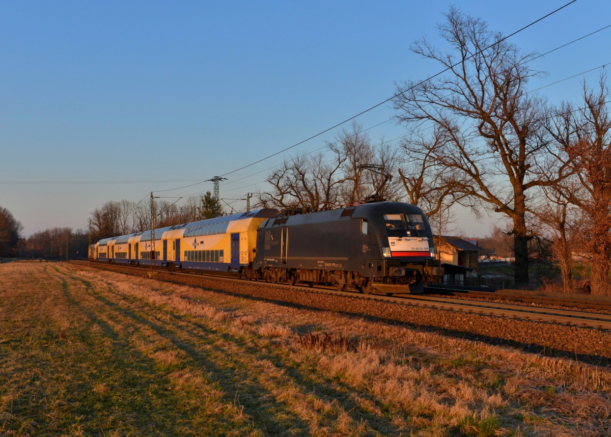 182 509 mit einem Meridian-Ersatzzug nach Kufstein am 11.03.2014 bei Happing.