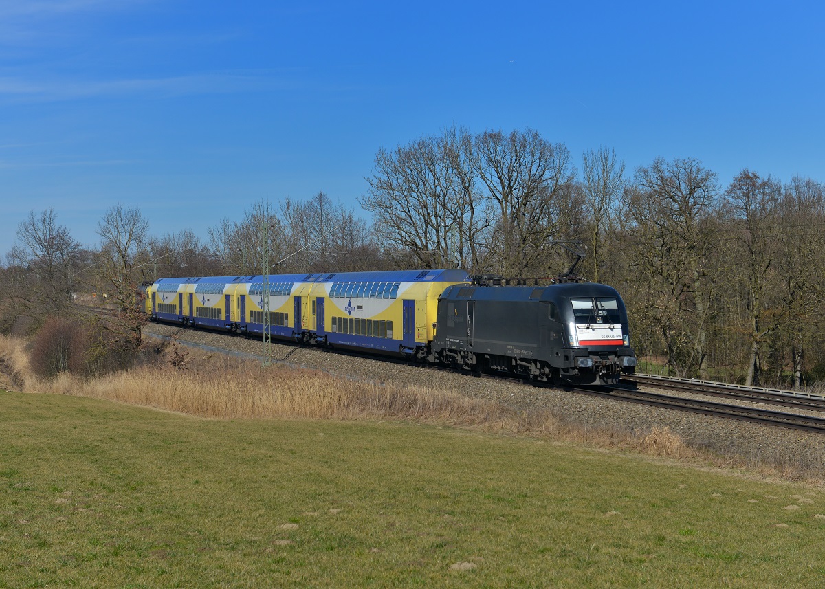 182 509 mit einem Meridian-Ersatzzug am 25.02.2014 bei Hilperting. 