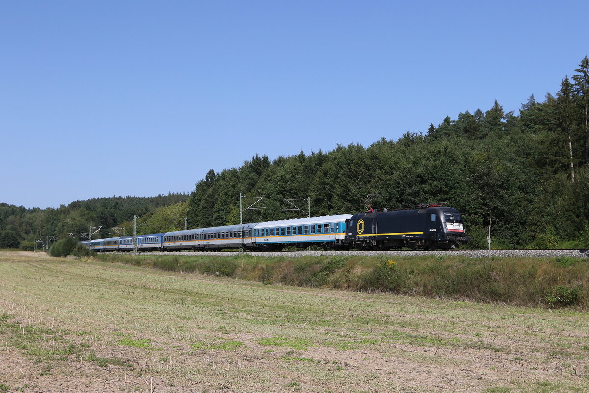 182 599 auf dem Weg nach München. Aufgenommen am 24. August 2024 bei Ascholtshausen.