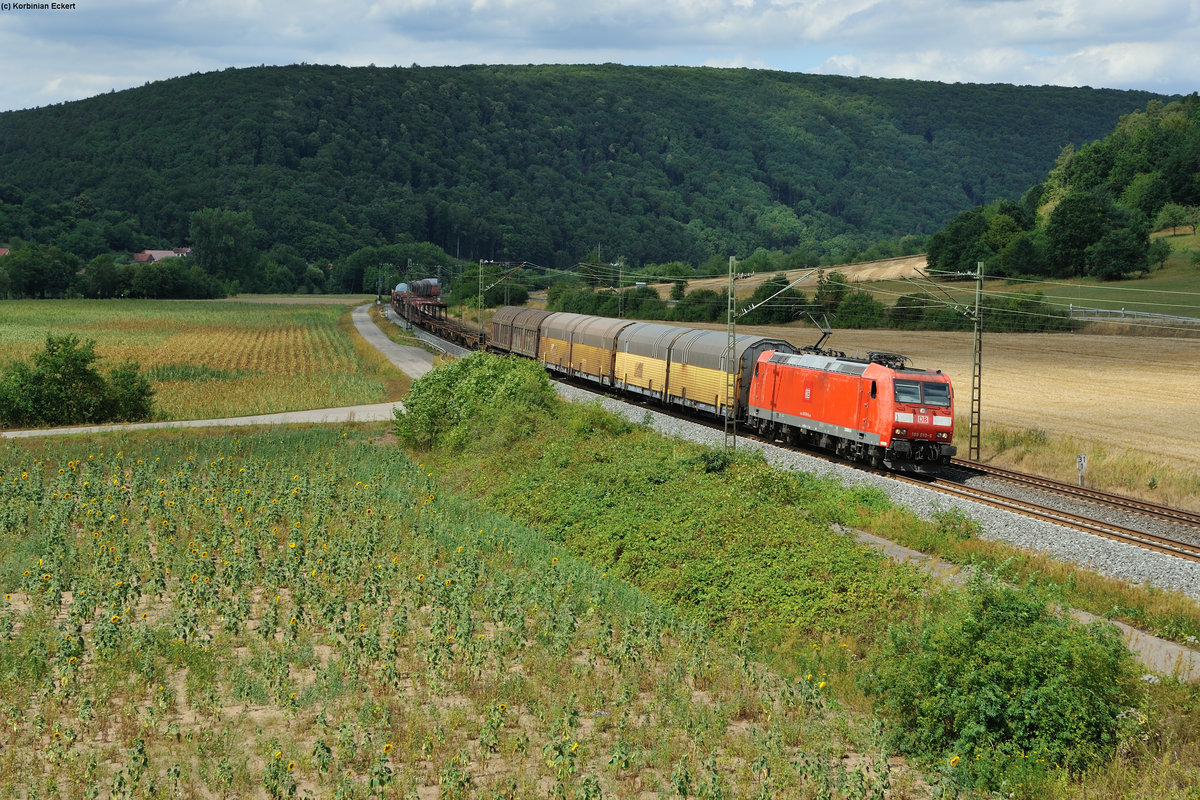 185 010-6 mit einem gemischten Güterzug bei Harrbach Richtung Würzburg, 23.07.2015