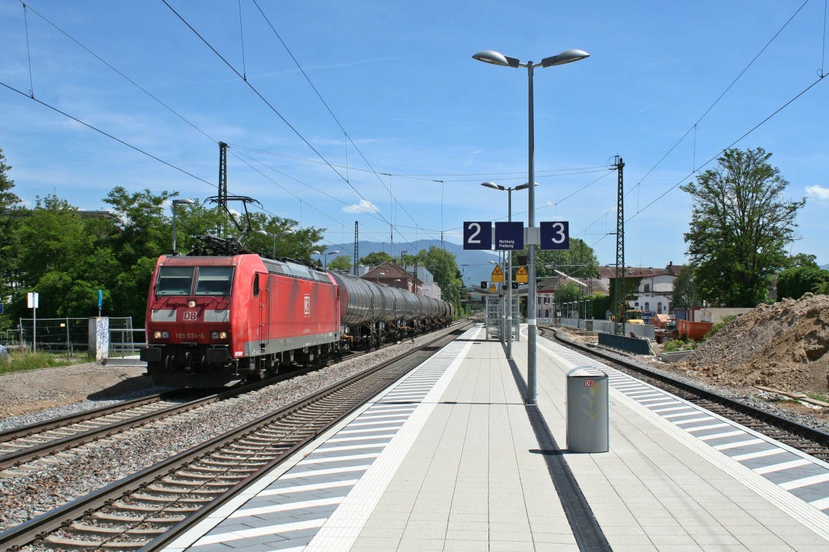 185 034-6 mit dem 44281 von Mulhouse-Ville (über Freiburg (Breisgau) Gbf) nach Offenburg am Nachmittag des 07.06.14 in Emmendingen.