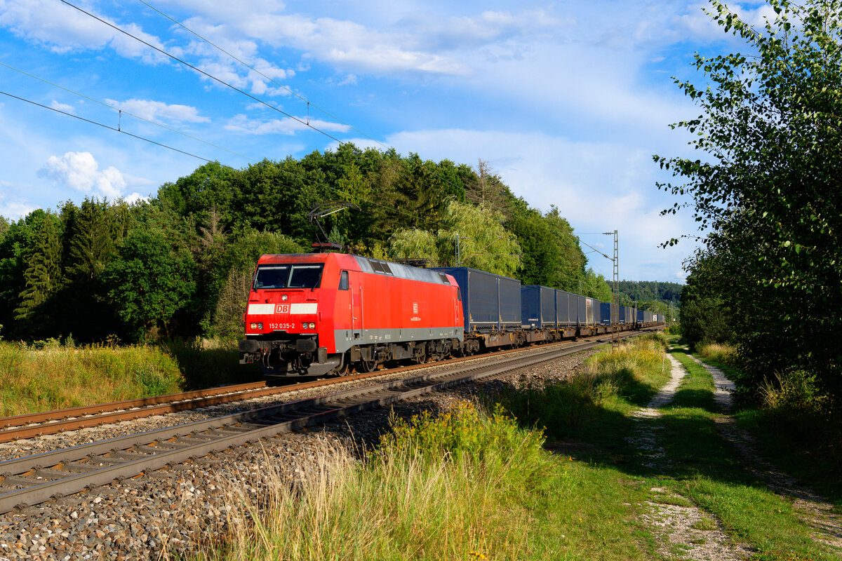 185 035 mit dem Hellmann KLV-Zug bei Postbauer-Heng Richtung Nürnberg, 18.08.2020