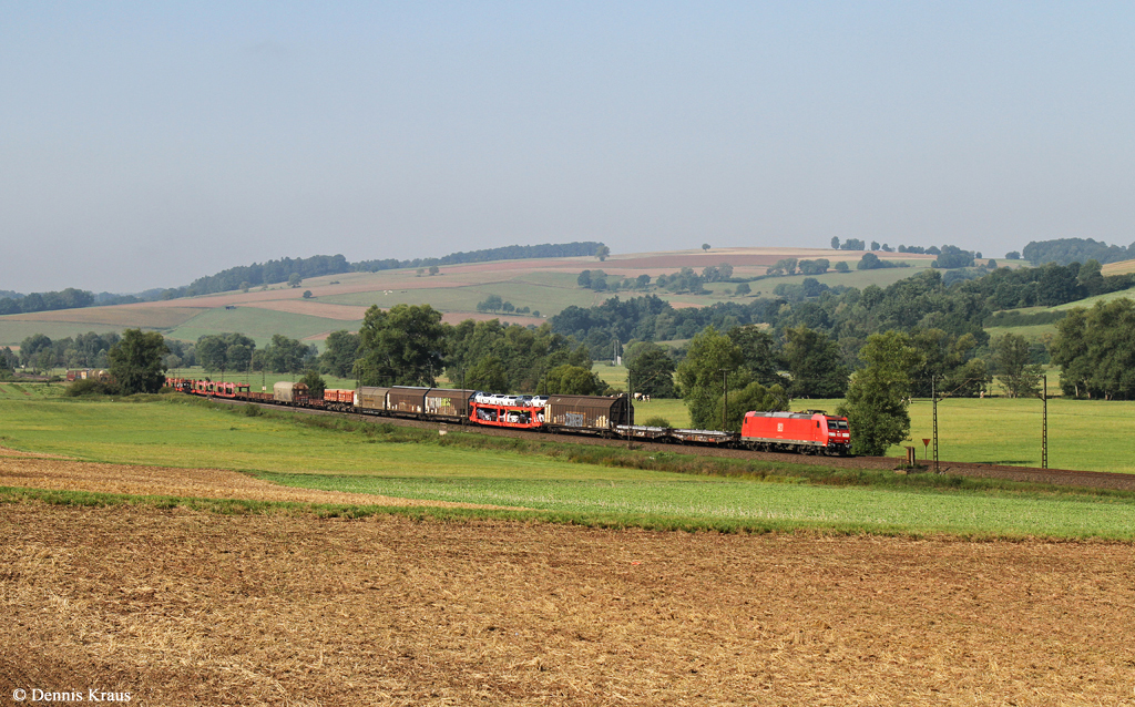 185 053 mit gemischten Güterzug am 21.08.2015 bei Haunetal-Neukirchen.