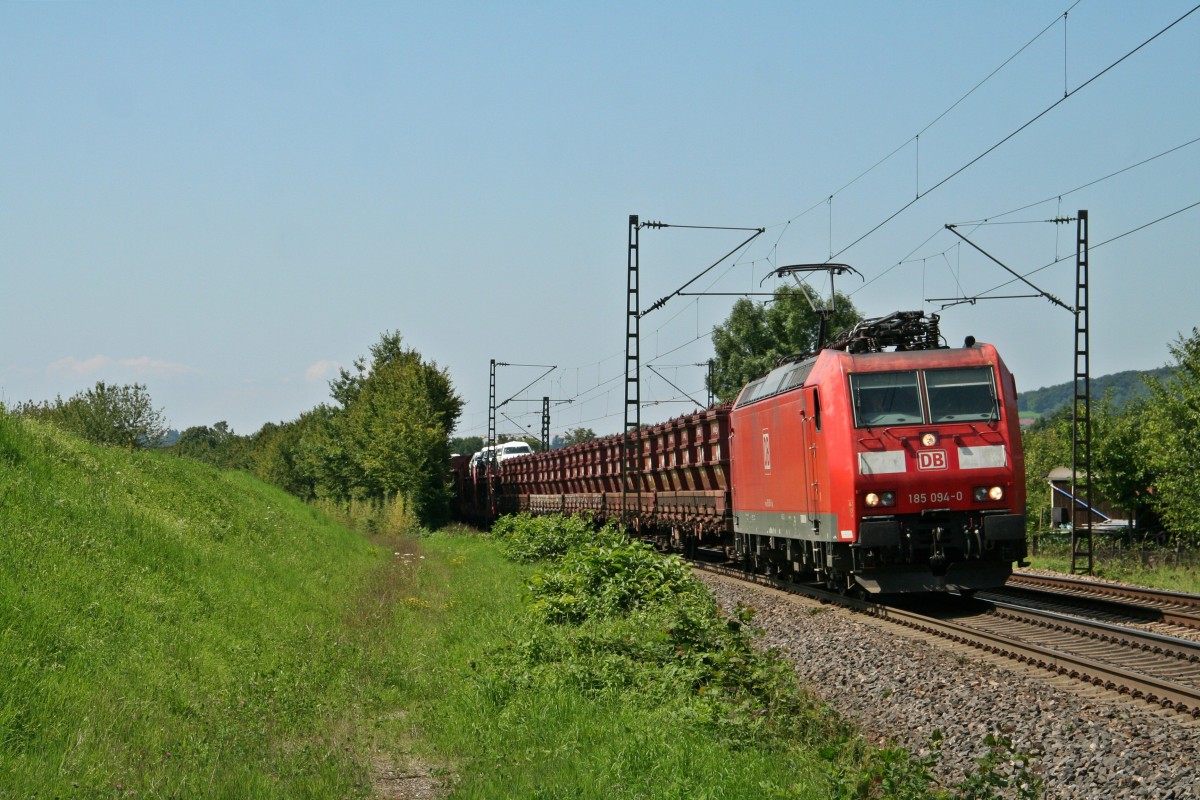 185 094-0 mit dem 51945 von Mannheim Rbf nach Basel Bad. Rbf am Nachmittag des 01.08.14 nrdlich von Kollmarsreute.