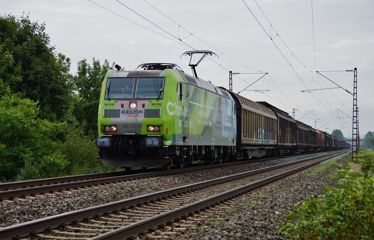 185 152-6 mit einen gemischten Güterzug bei Thüngersheim am 08.09.15.