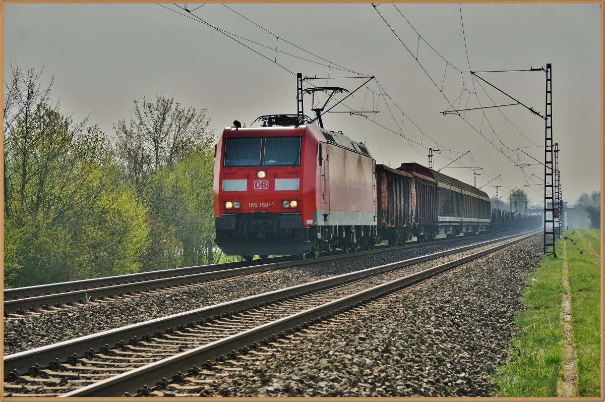 185 159-1 mit einen gemischten Güterzug bei Thüngersheim am 01.04.14.