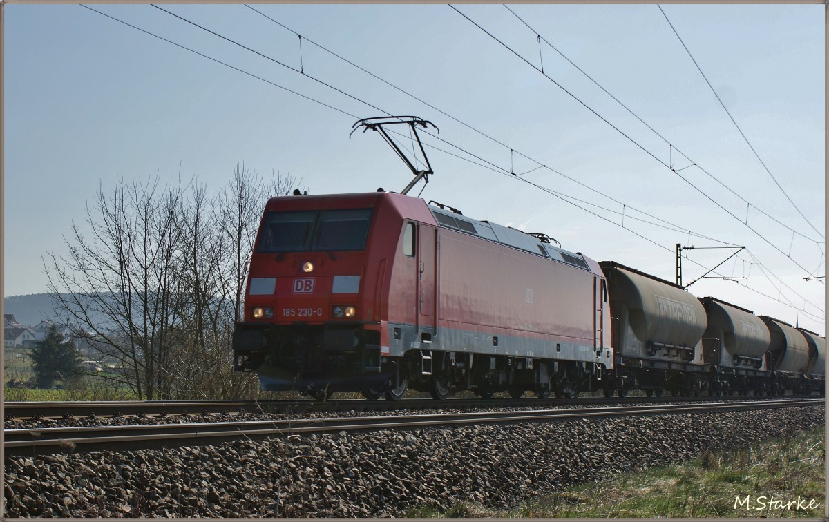 185 230-0 mit einen Güterzug bei Thüngersheim am 11.03.14.