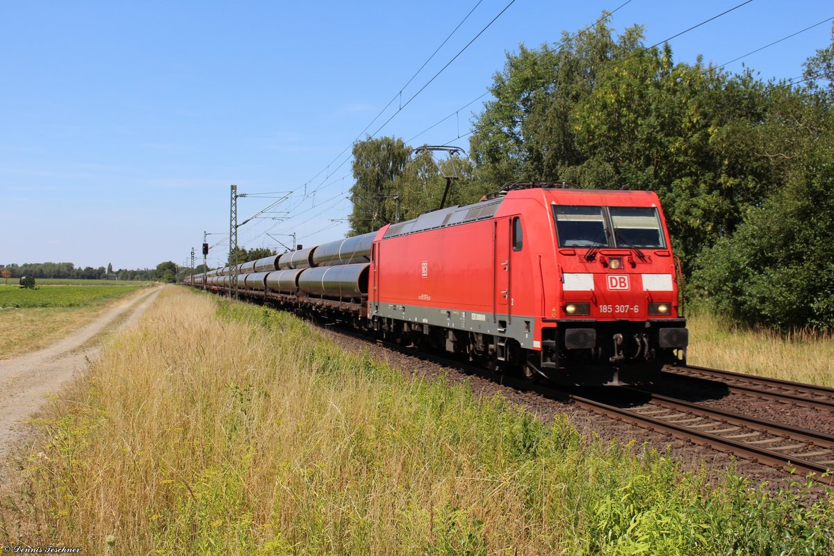 185 307-6 DB mit zahlreichen Rohren bei Woltorf am 24.07.2018