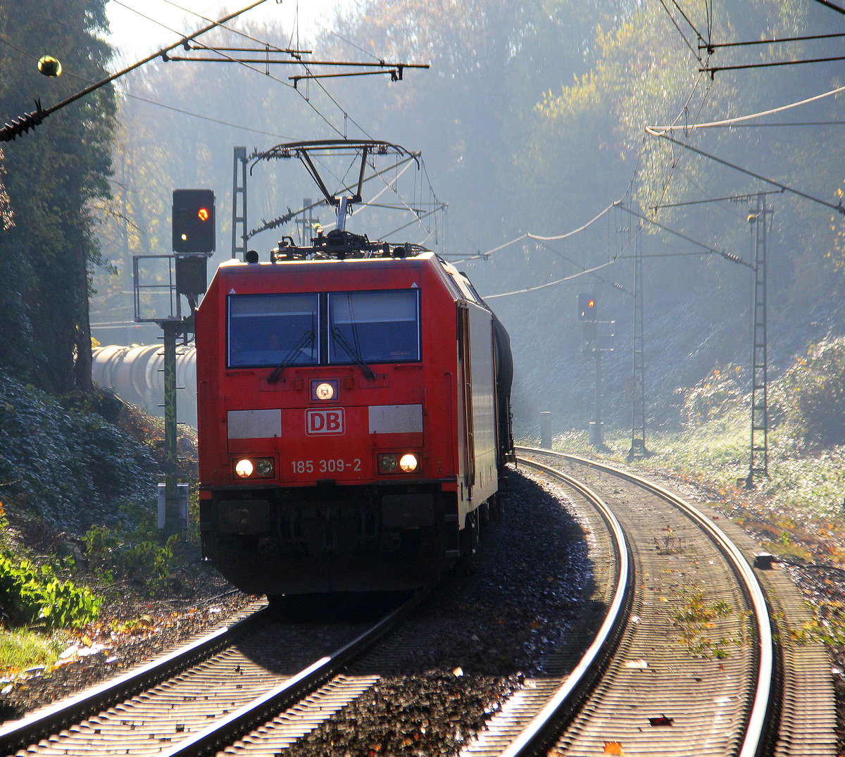 185 309-2 DB kommt aus Richtung Köln,Aachen-Hbf und fährt durch Aachen-Schanz mit einem Ölleerzug aus Basel-SBB(CH) nach Antwerpen-Petrol(B) und fährt in Richtung Aachen-West. Aufgenommen vom Bahnsteig von Aachen-Schanz. 
Bei schönem Herbstwetter am Kalten Vormittag vom 17.11.2018.