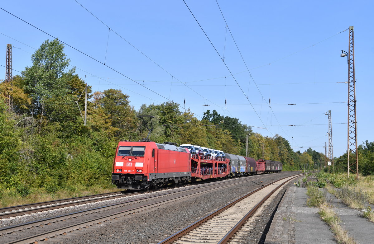 185 364 mit einem gemischten Güterzug am 20.08.2019 in Banteln