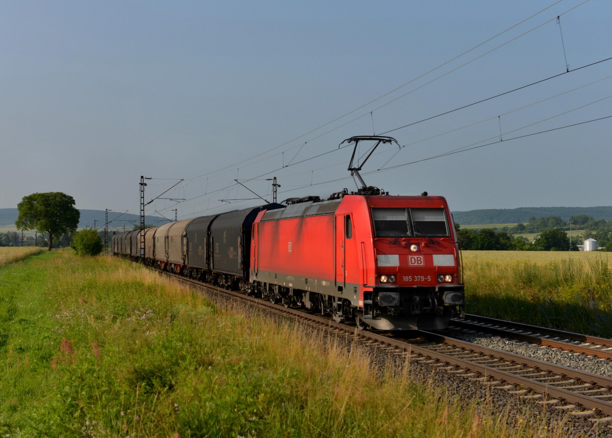 185 379 mit einem Stahlzug am 06.07.2013 bei Himmelstadt.