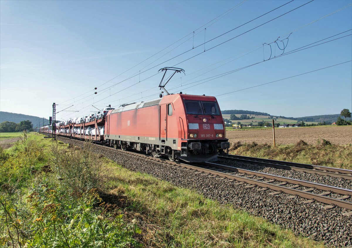 185 387-8 am 08.09.2021 mit einen Autozug bei Reilos unterwegs.