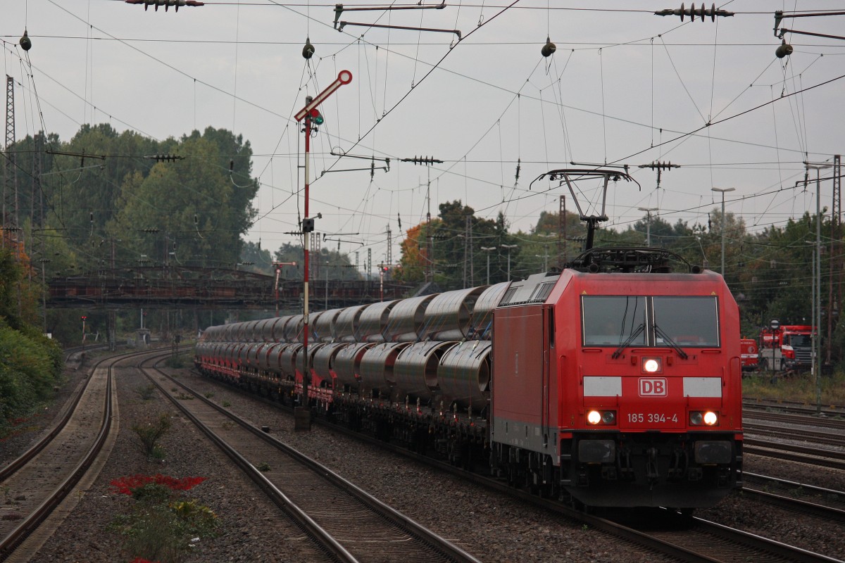 185 394 am 9.10.13 mit einem Röhrenzug in Düsseldorf-Rath.