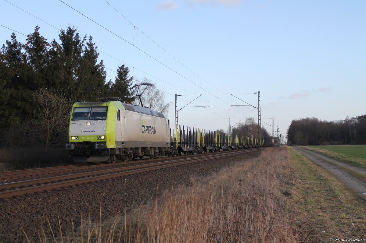 185 501-4 Captrain mit leerem Stahlzug bei Woltorf am 10.03.2017