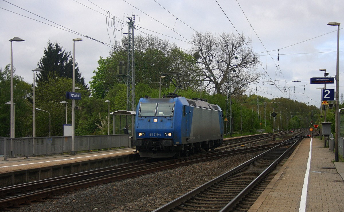 185 515-4  von Railtraxx  kommt aus Richtung Aachen-West,Laurensberg,Richterich und fährt durch Kohlscheid und fährt als Lokzug aus Aachen-West nach Herzogenrath  und fährt durch Kohlscheid und fährt in Richtung Herzogenrath.
Bei Wolken am Morgen vom 4.5.2015. 