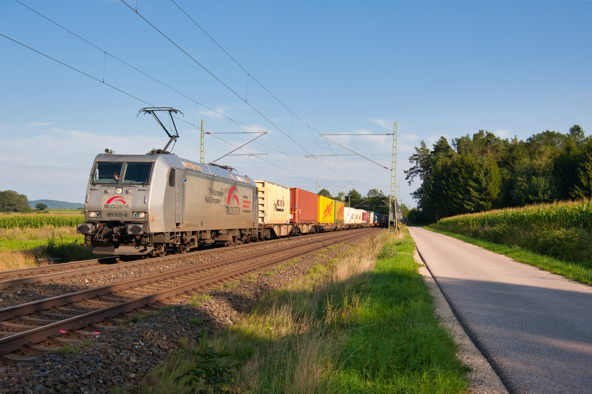 185 537 TXL mit einem KLV-Zug bei Triesdorf Richtung Würzburg, 23.08.2019