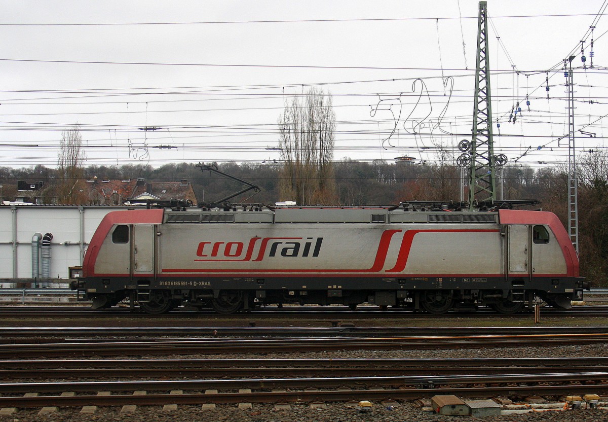 185 591-5  von Crossrail steht in Aachen-West. 
Aufgenommen vom Bahnsteig in Aachen-West.
Bei Nieselregen am Morgen vom 22.2.2016.
