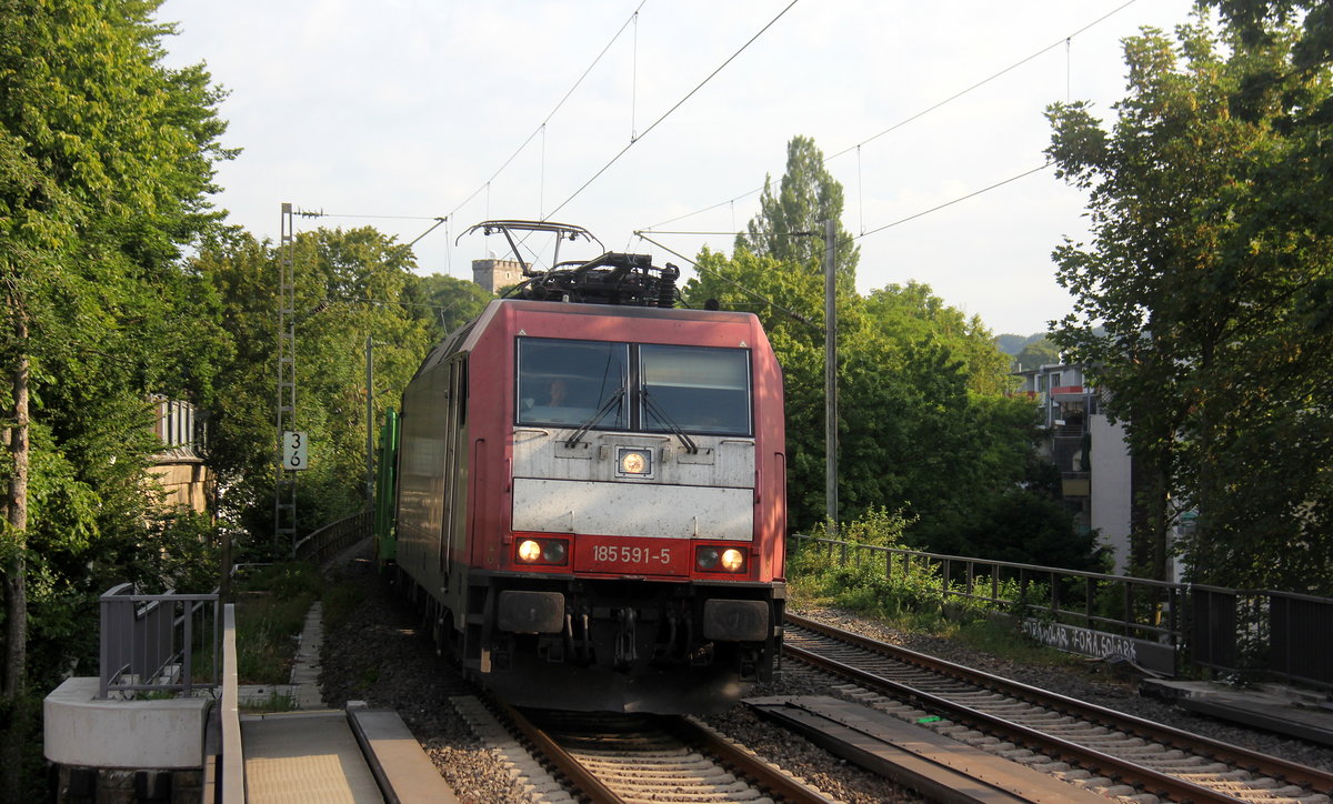 185 591-5 von der Rurtalbahn  kommt aus Richtung Aachen-West mit einem Autozug aus Zeebrugge(B) nach Passau(D) und fährt durch Aachen-Schanz in Richtung Aachen-Hbf,Aachen-Rothe-Erde,Stolberg-Hbf(Rheinland)Eschweiler-Hbf,Langerwehe,Düren,Merzenich,Buir,Horrem,Kerpen-Köln-Ehrenfeld,Köln-West,Köln-Süd. Aufgenommen vom Bahnsteig von Aachen-Schanz. 
Bei Sommerwetter am Morgen vom 12.7.2019.