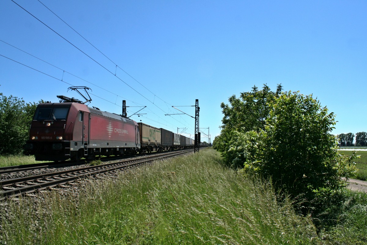 185 595-6 mit einem Containerzug in Richtung Norden am Nachmittag des 23.05.14 westlich von Hgelheim.