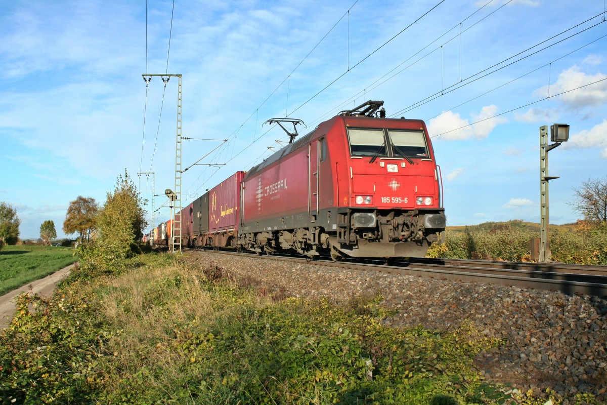 185 595-6 mit einem KLV-Zug gen Sden am Nachmittag des 09.11.13 bei der Einfahrt in den Bahnhofsbereich von Mllheim (Baden).