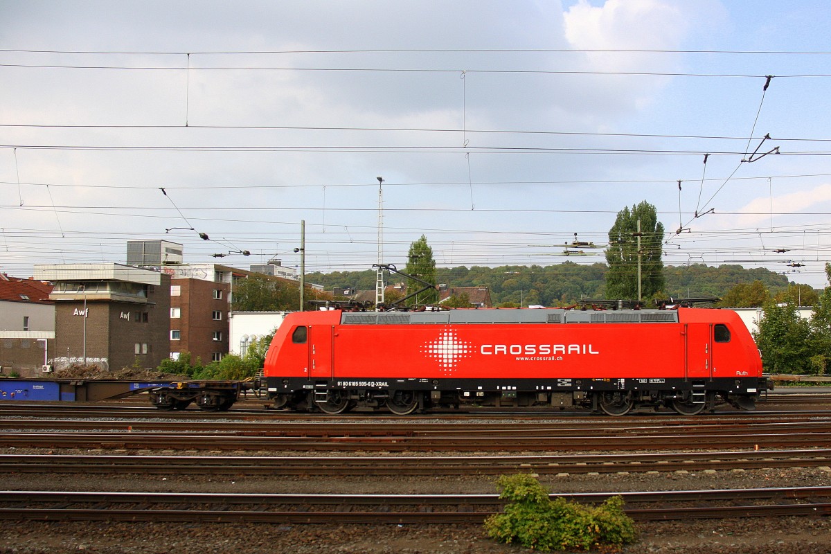 185 595-6   Ruth  von Crossrail fährt mit einem langen MSC-Containerzug aus Antwerpen-Berendrecht(B) nach Weil Am Rhein(D) bei der Ausfahrt aus Aachen-West und fährt in Richtung Aachen-Schanz,Aachen-Hbf,Köln.
Aufgenommen vom Bahnsteig in Aachen-West am 5.9.2014.