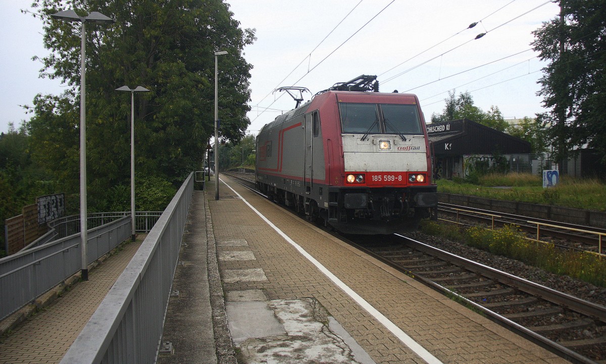 185 599-8 von Crossrail kommt als Lokzug die Kohlscheider-Rampe hoch aus Richtung Neuss und fährt in Richtung Aachen-West und fährt durch Kohlscheid. 
Bei Regenwolken am Nachmittag vom 12.9.2015.