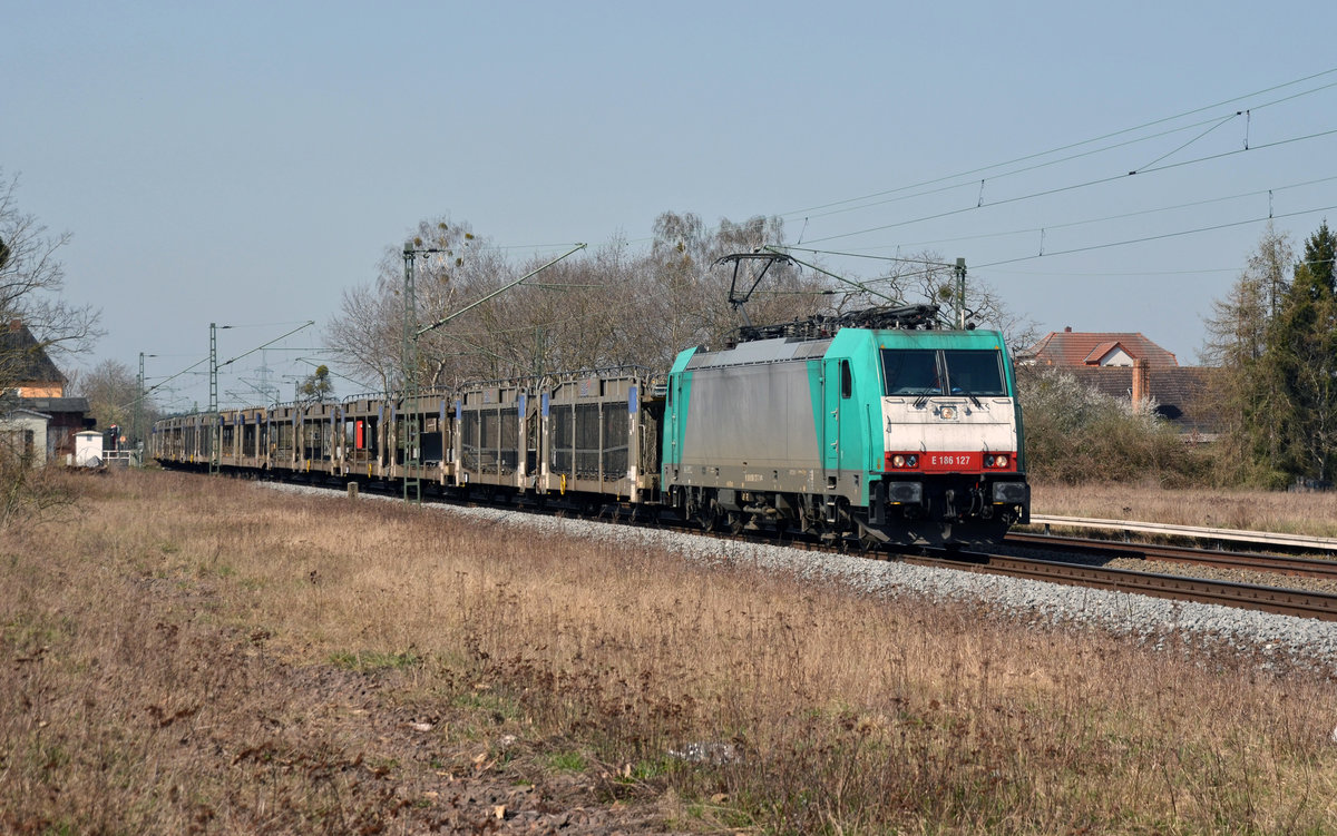 186 127 der ITL/Captrain führte am 10.04.18 einen leeren BLG-Autozug durch Jütrichau Richtung Roßlau.