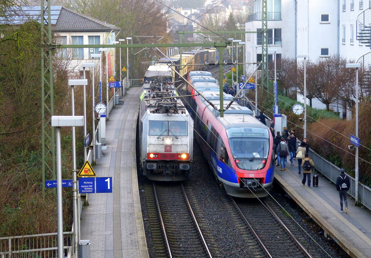 186 150 von Crossrail und 486 503 von BLS kommen aus Richtung Aachen-West mit einem GTS-Containerzug aus Zeebrugge-Ramskapelle(B) nach Piacenza(I) und fahren durch Aachen-Schanz in Richtung Aachen-Hbf,Aachen-Rothe-Erde,Stolberg-Hbf(Rheinland)Eschweiler-Hbf,Langerwehe,Düren,Merzenich,Buir,Horrem,Kerpen-Köln-Ehrenfeld,Köln-West,Köln-Süd. 
Aufgenommen von der Brücke in Aachen-Schanz. 
Am Kalten Morgen vom 30.1.2018.