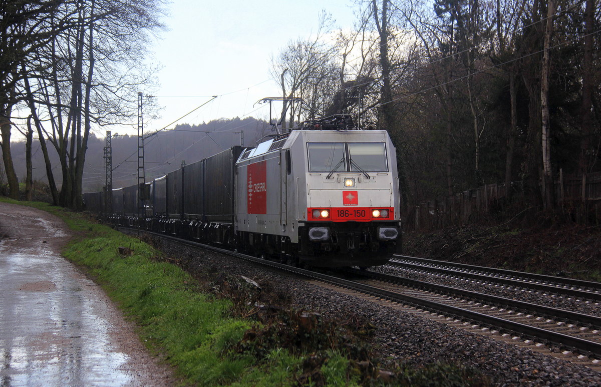 186 150 von Crossrail  kommt die Gemmenicher-Rampe herunter nach Aachen-West mit einem GTS-Containerzug aus Zeebrugge-Ramskapelle(B) nach Piacenza(I). 
Aufgenommen an der Montzenroute am Gemmenicher-Weg.
Bei Strömenden Regen am Nachmittag vom 7.3.2019.