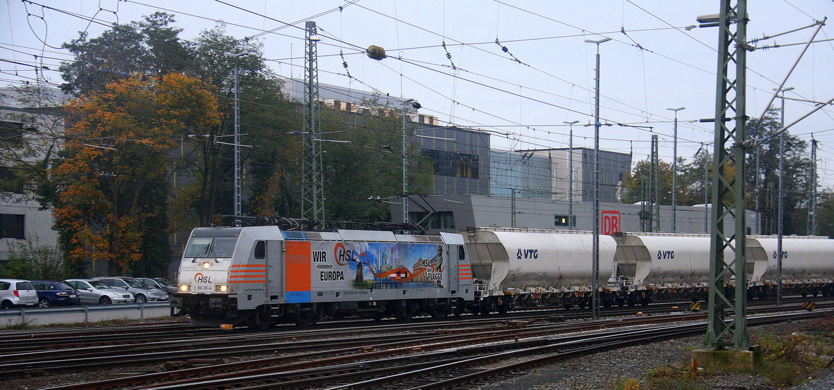 186 181-4 von HSL kommt aus Richtung Montzen/Belgien mit einem Zuckerleerzug aus Antwerpen-Lillo(B) nach Wabern(D) und fährt in Aachen-West ein. 
Aufgenommen vom Bahnsteig in Aachen-West.
In der Abendstimmung Am Abend vom 7.11.2017.