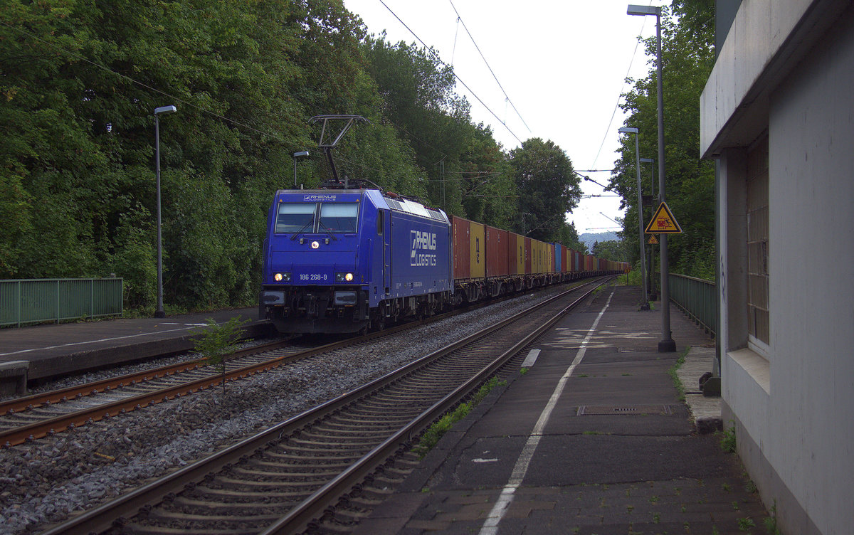 186 268-9 von Rhenus-Logistik kommt mit einem langen MSC-Containerzug aus Germersheim(D) nach Antwerpen-Krommenhoek(B) und kommt aus Richtung Koblenz und fährt durch Rolandseck in Richtung Bonn,Köln,Aachen.
Aufgenommen vom Bahnsteig in Rolandseck. 
Bei Sommerwetter am Nachmittag vom 31.7.2018.