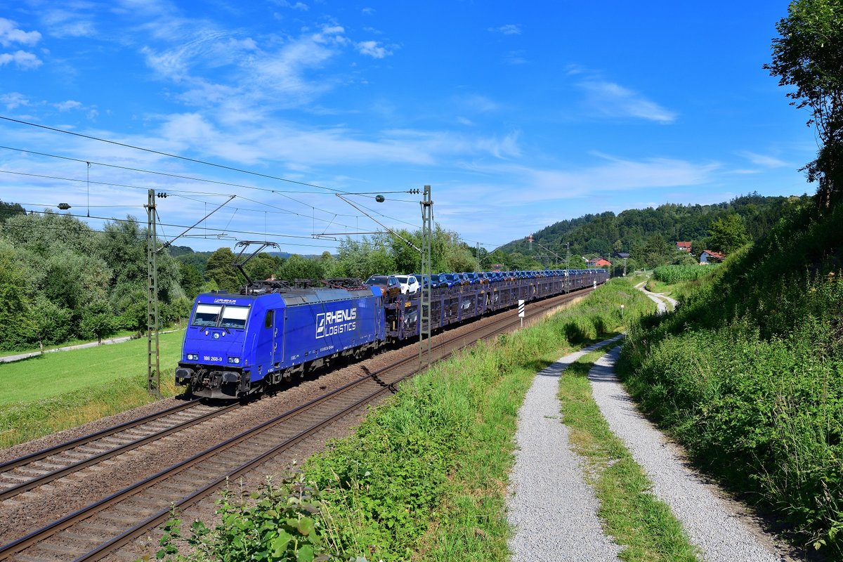 186 268 mit einem Autozug am 09.07.2020 bei Seestetten.