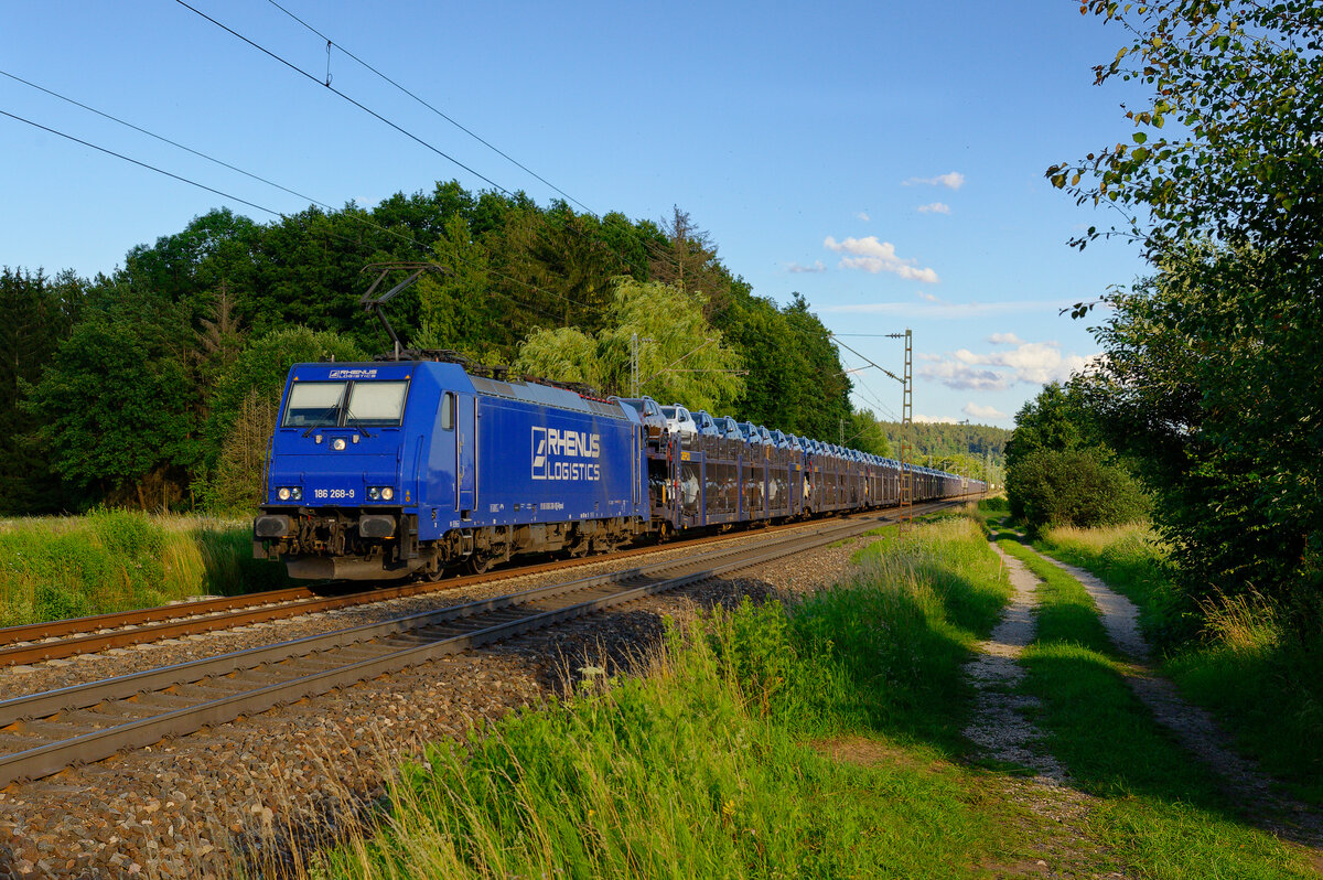 186 268 Railpool/Rhenus mit einem Autotransportzug bei Postbauer-Heng Richtung Nürnberg, 09.07.2020