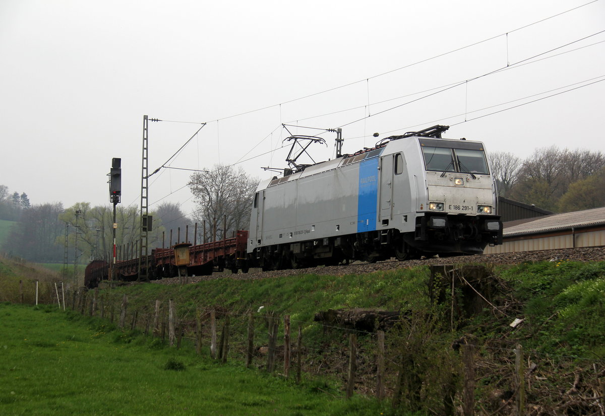 186 291-1 von Lineas/Railpool kommt die Gemmenicher-Rampe herunter nach Aachen-West mit einem gemischten Güterzug aus Antwerpen-Noord(B) nach Köln-Gremberg(D). 
Aufgenommen von einem Weg in Reinartzkehl. 
Am Nachmittag vom 9.4.2019.