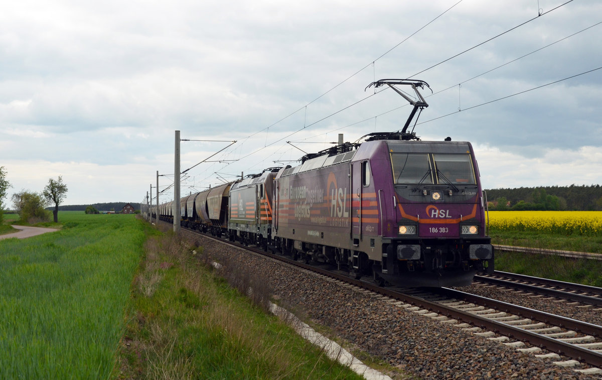 186 383 der HSL schleppte am 25.04.20 neben einem Transcereal-Zug noch 187 535 als Wagenlok mit. Hier rollt der Silozug durch Rodleben Richtung Roßlau.