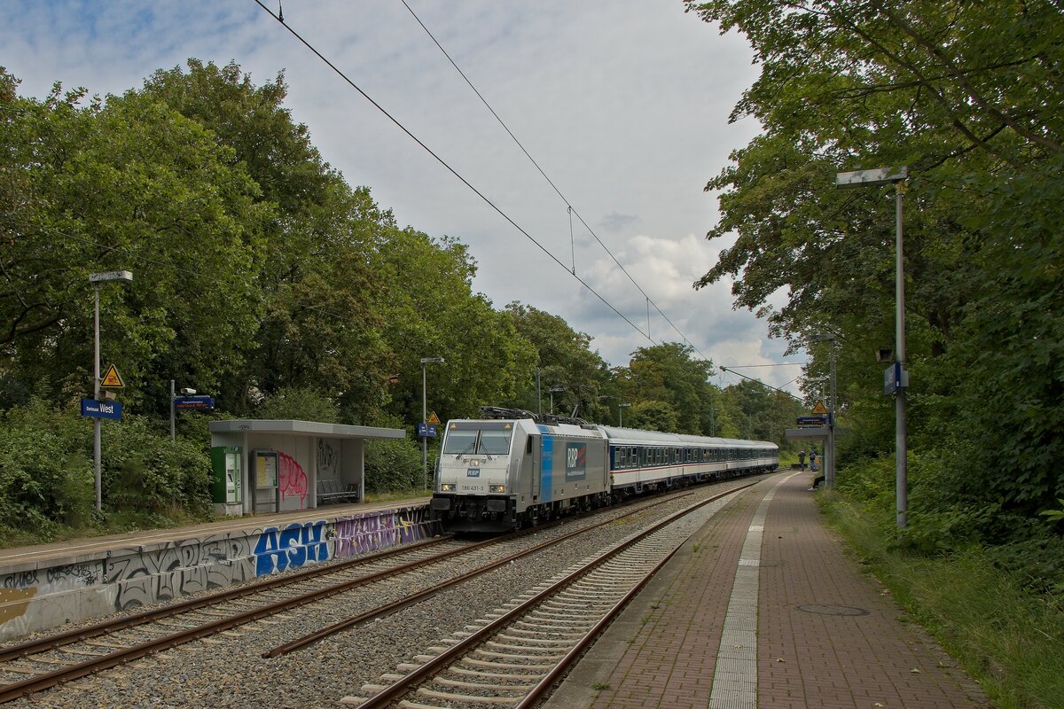 186 431-3 mit einem S-Bahn-Verstärkerzug der TRI anlässlich der Veranstaltung  Dortmund Olé  am Haltepunkt Dortmund-West (05.08.2023)