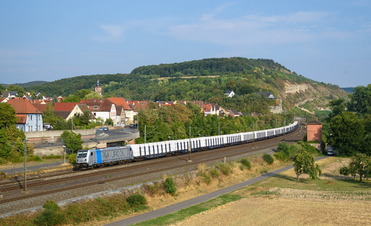 187 310 Railpool mit Holzzug in Richtung Gemünden(Main).(Retzbach-Zellingen 4.8.2018).