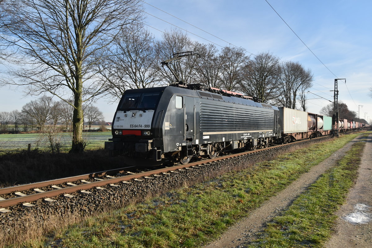 189 099 mit einem Containerzug bei Boisheim am 19.1.2019 gen Venlo fahrend. 