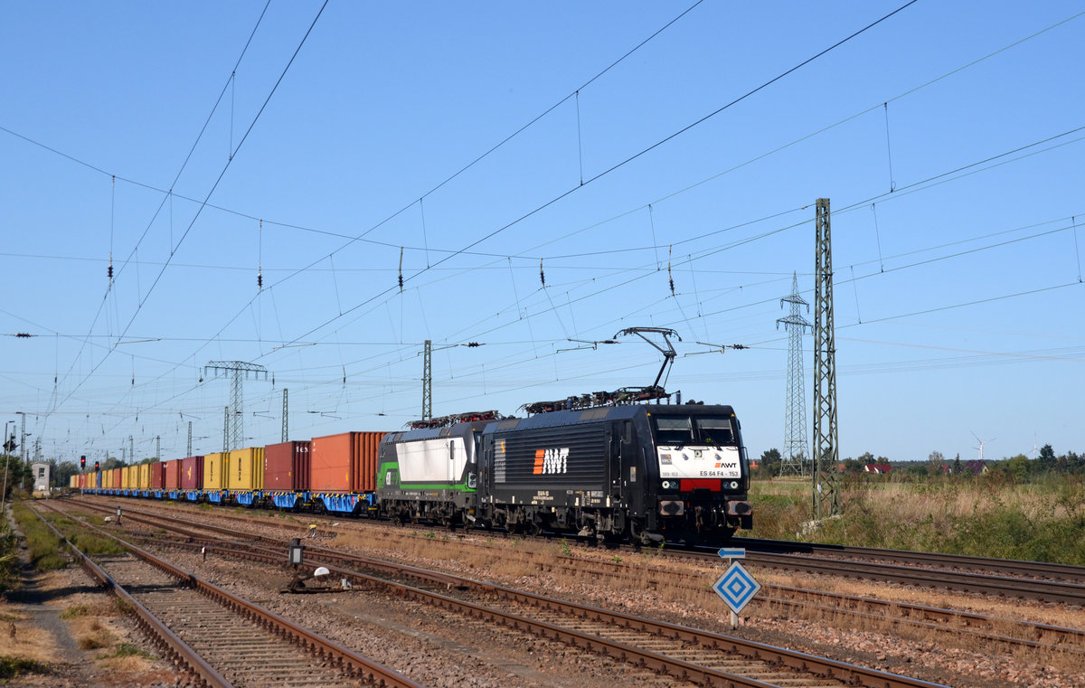 189 153 der AWT schleppte am 22.09.19 einen Containerzug nebst 193 742 der ELL durch Weissig Richtung Dresden.