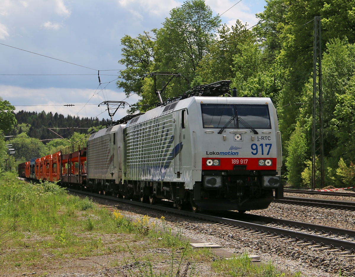 189 901 in Doppeltraktion mit 189 912 und leeren Autotransportwagen in Fahrtrichtung München. Aufgenommen in Aßling am 07.05.2015.