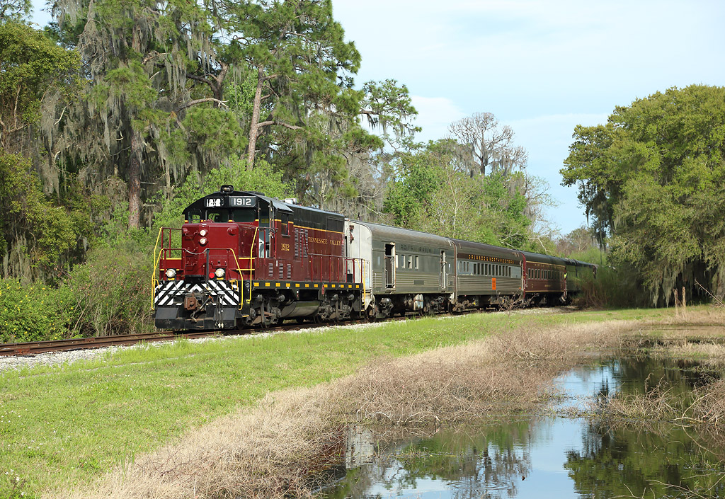 1912 passes Gator Pond whilst hauling an Orlando Northwestern Train from Mount Dora to Tavares, 2 March 2019.

From April they will cease to run on this portion of line...