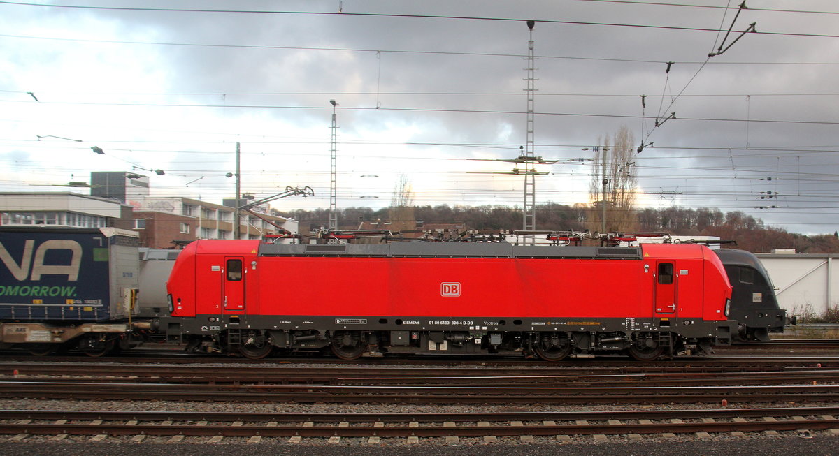 193 308 DB fährt mit einem LKW-Zug aus Zeebrugge-Vorming(B) nach Novara-Boschetto(I) bei der Ausfahrt aus Aachen-West und fährt in Richtung Aachen-Schanz,Aachen-Hbf,Aachen-Rothe-Erde,Stolberg-Hbf(Rheinland)Eschweiler-Hbf,Langerwehe,Düren,Merzenich,Buir,Horrem,Kerpen-Köln-Ehrenfeld,Köln-West,Köln-Süd. 
Aufgenommen vom Bahnsteig in Aachen-West.
Bei Sonne und Regenwolken am Nachmittag vom 21.12.2018. 