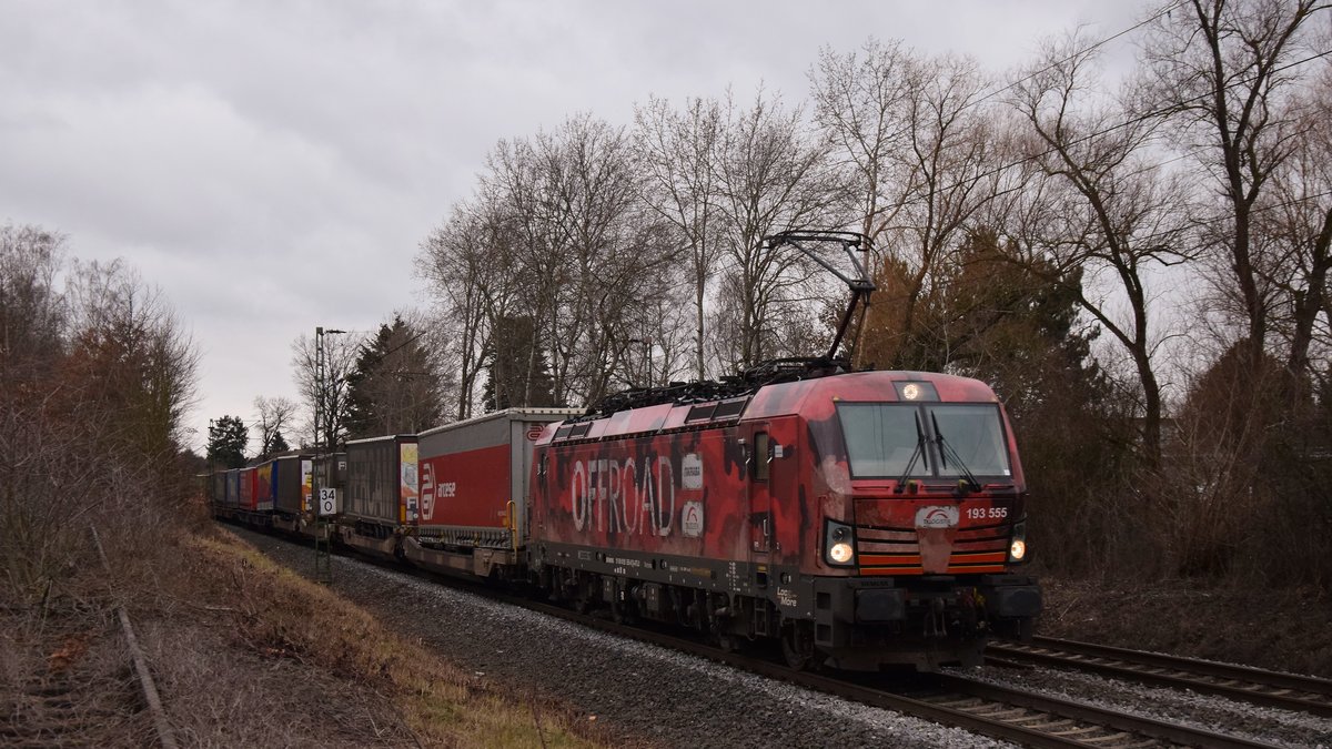 193 555  Offroad  zieht den TX-Zug nach München über die Rhein-Main Bahn kurz vor Darmstadt Kranichstein. Aufgenommen am 30.1.2019 15:14