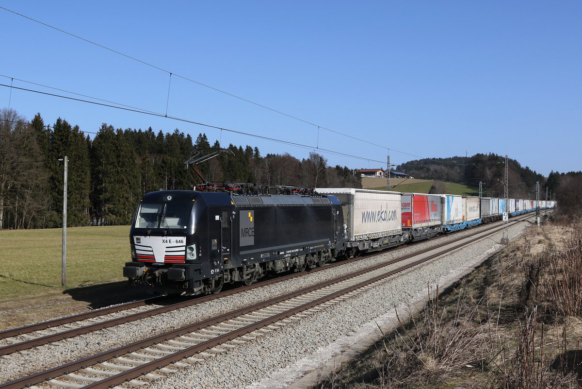 193 646 mit einem  EKOL-Zug  aus Salzburg kommend am 25. Februar 2021 bei Grabenstätt im Chiemgau.