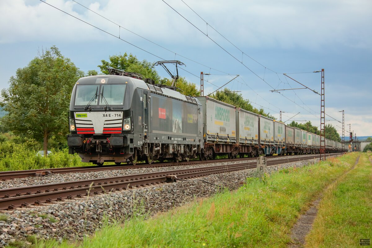 193 714 BLS mit KLV in Thüngersheim, August 2021.