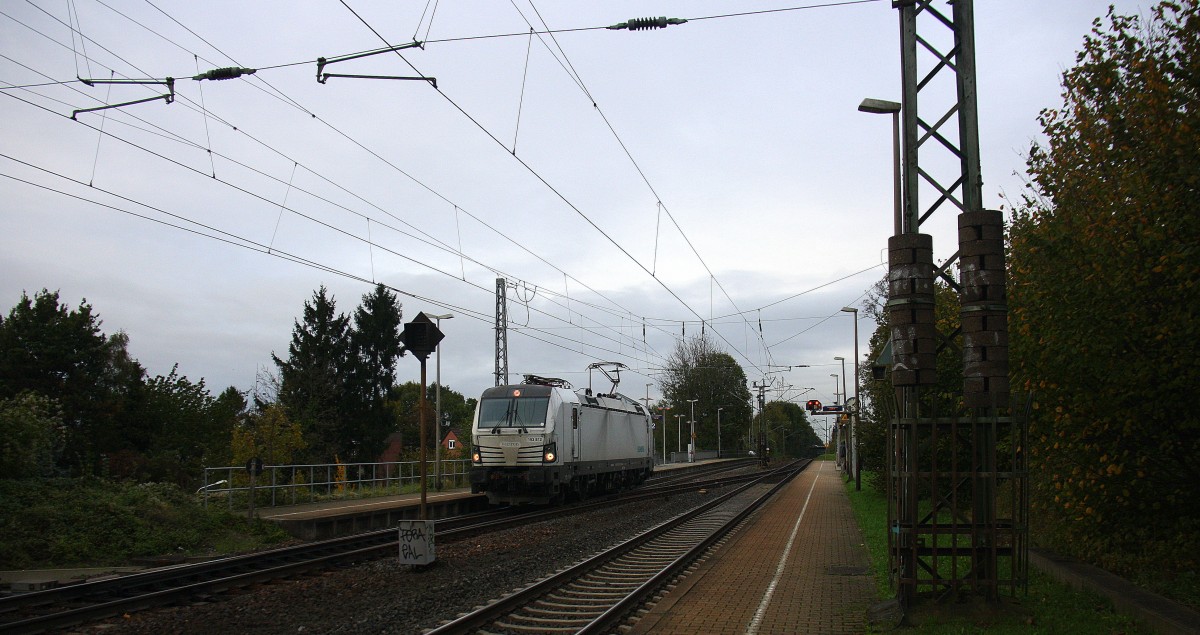 193 812-5 von Siemens kommt die Kohlscheider-Rampe hoch aus Richtung Neuss,Herzogenrath  als Lokzug aus Neuss nach Aachen-West und fährt durch Kohlscheid in Richtung Richterich,Laurensberg,Aachen-West. 
Bei Wolken am Nachmittag vom 24.10.2014. 