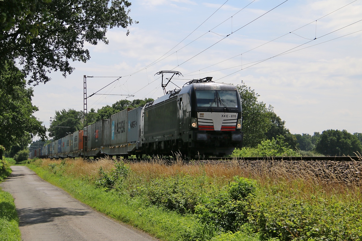 193 870 mit Containerzug in Fahrtrichtung Verden(Aller). Aufgenommen in Eystrup am 22.07.2015.